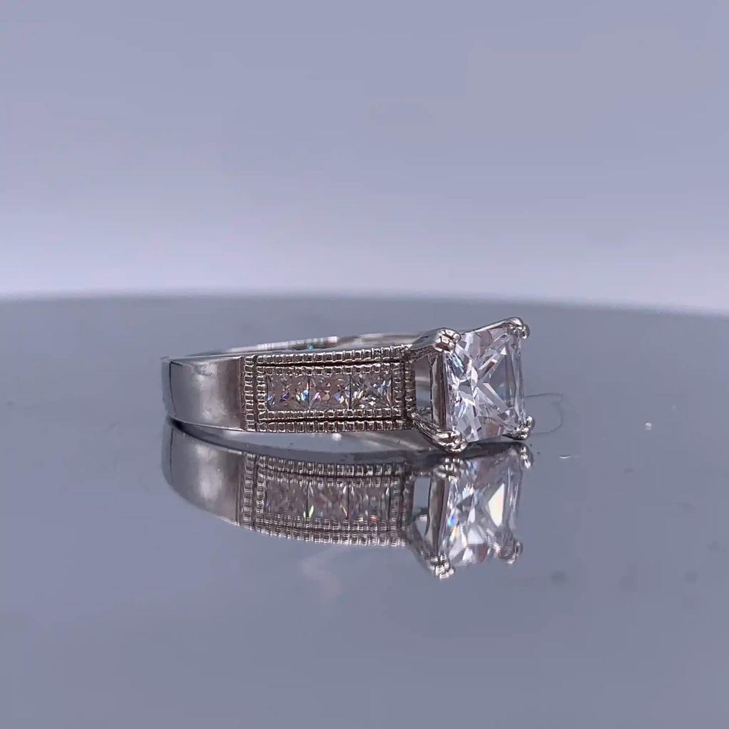 Vintage Sterling-Silver Princess Cut Cubic Zirconia Engagement Ring - Hand-Me-Diamonds